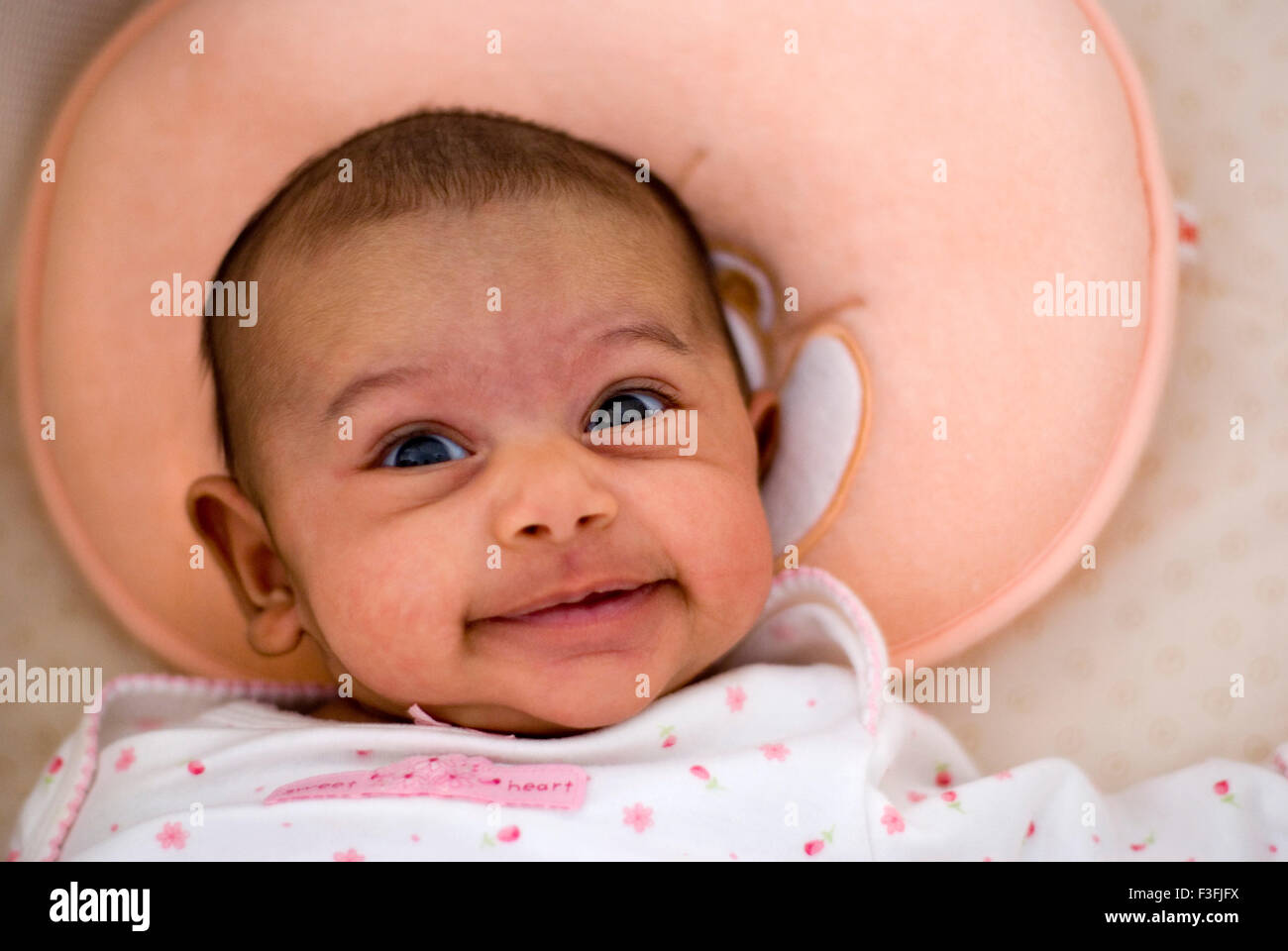 Baby Girl Namya ; two months old ; face ; expressions ; emotions and moods MR Stock Photo