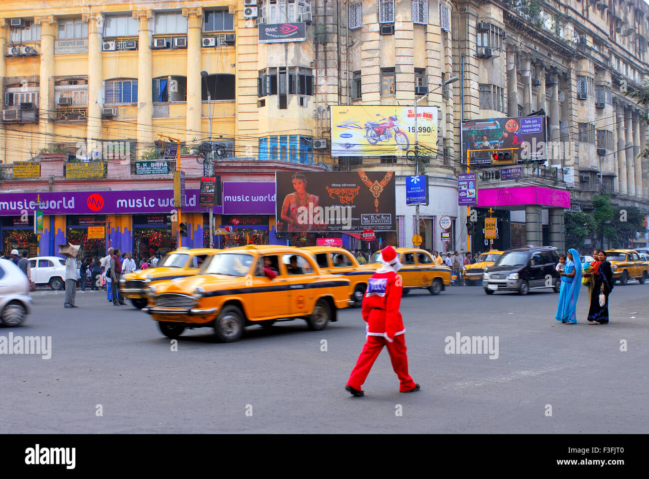 Santa Claus crossing Park Street ; Calcutta ; India Stock Photo