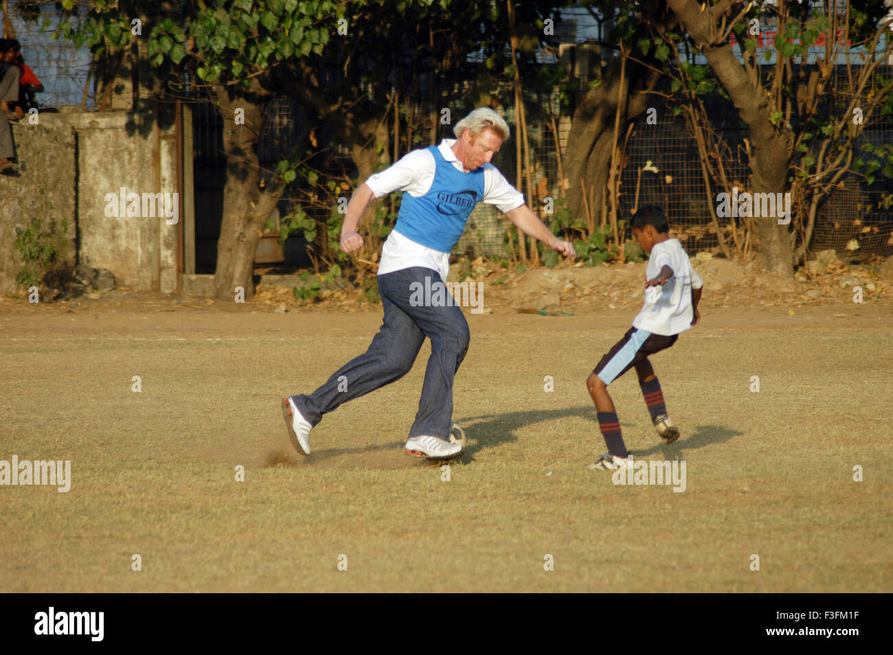 Boris Franz Becker visits a football program organized by an NGO Magic Bus in Bombay now Mumbai ; Maharashtra ; India NO MR Stock Photo