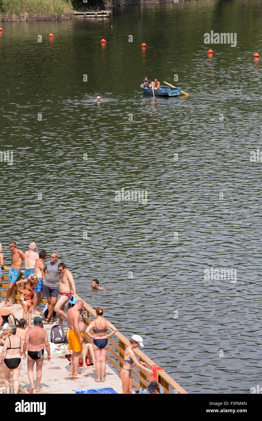 Crowd of people at the Bear Lake (Lacu Ursu) in Sovata, Transylvania, Romania Stock Photo