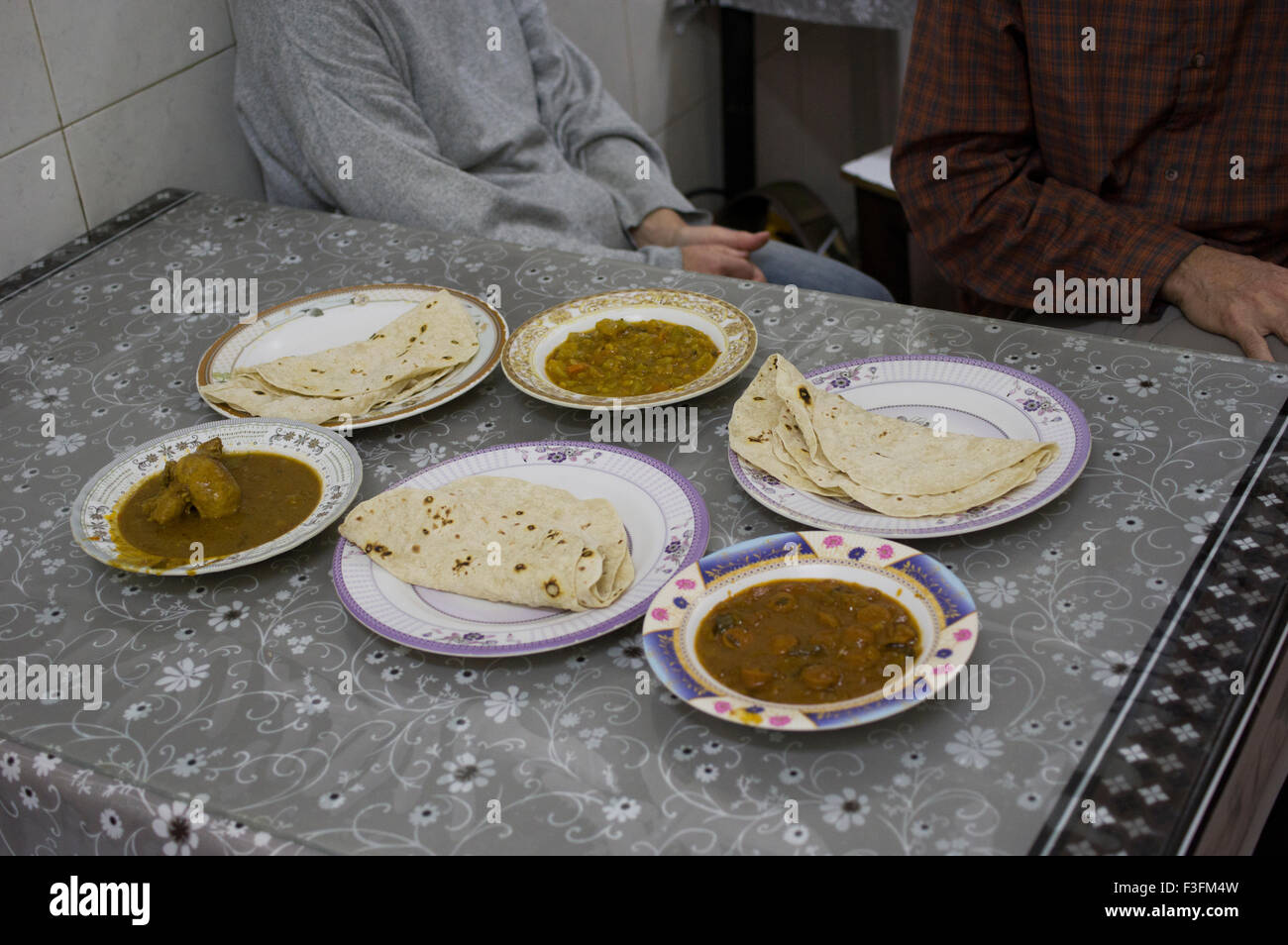 Plates of food in a small restaurant in Muscat in the Sultanate of Oman