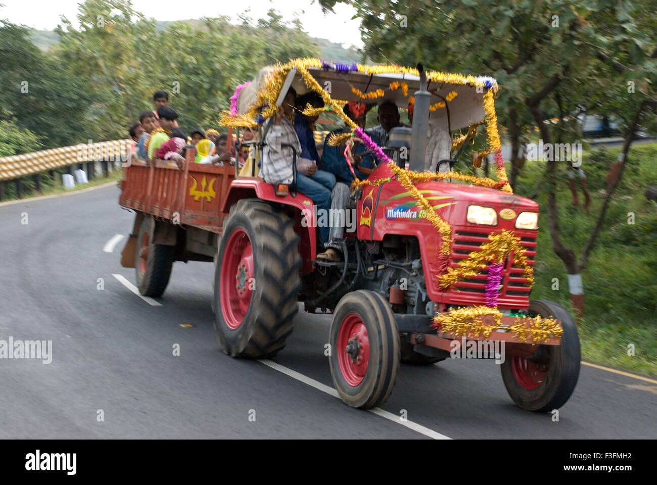 Tractor ; mode of transport on hilly regions Champaner Pavagadh ; Panchmahals district ; Gujarat state ; India ; Asia Stock Photo