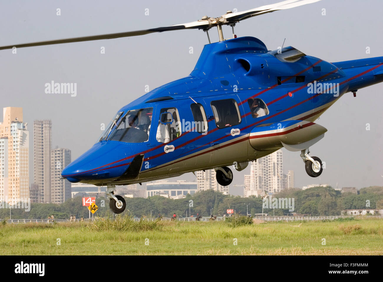 Helicopter landing, India, Asia Stock Photo