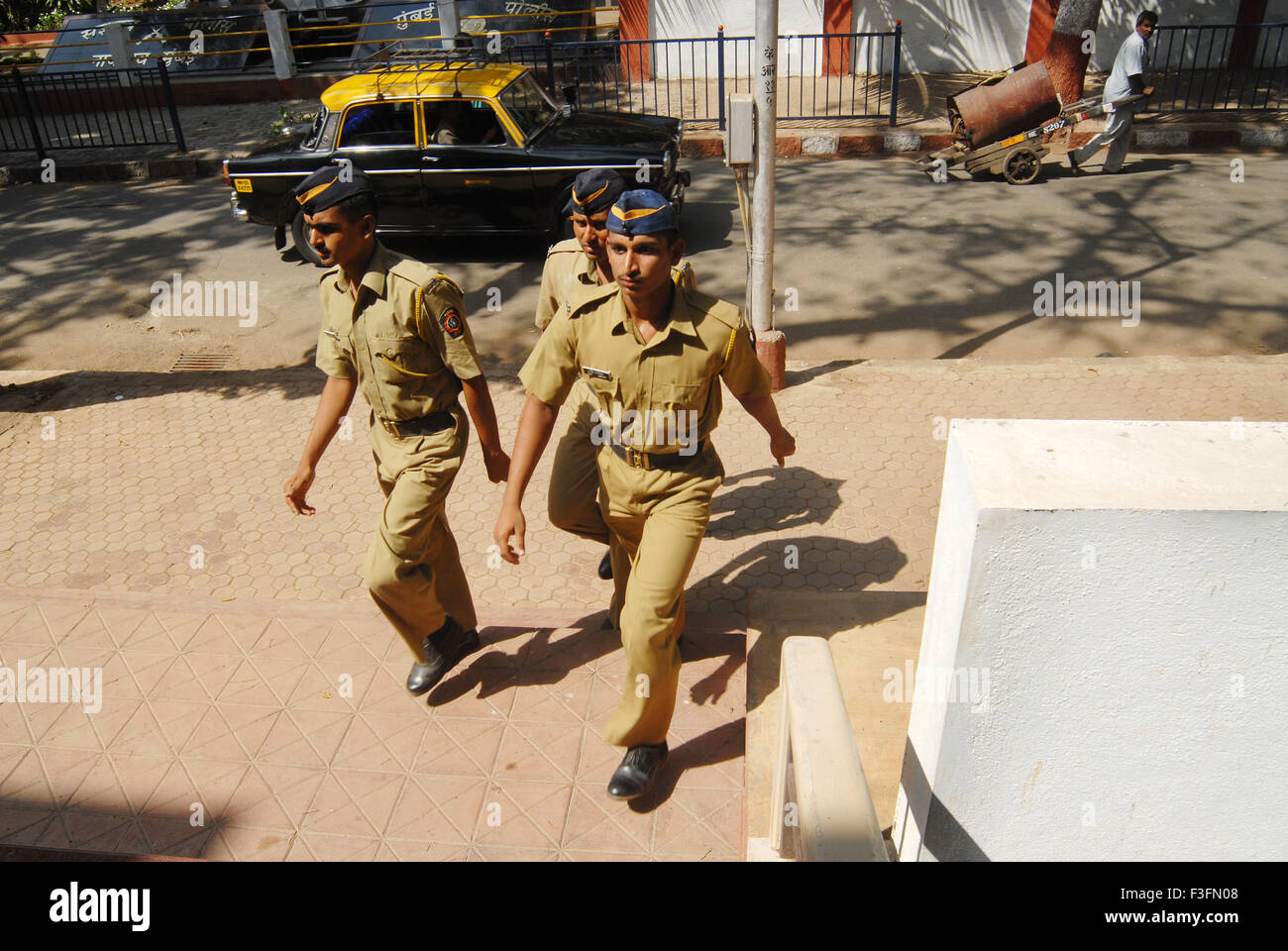 Mumbai police constables are walking to attend the meditation camp ; Bombay now Mumbai ; Maharashtra ; India NO MR Stock Photo