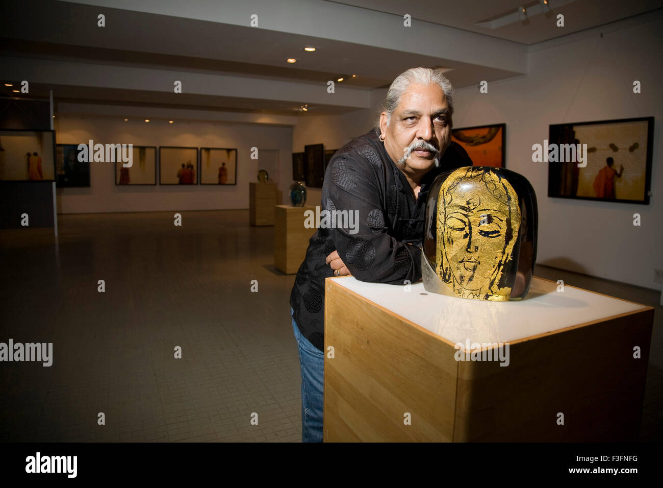 Charan Sharma famous Indian artist at museum art gallery Kala Ghoda ; Bombay now Mumbai ; Maharashtra ; India NO MR Stock Photo