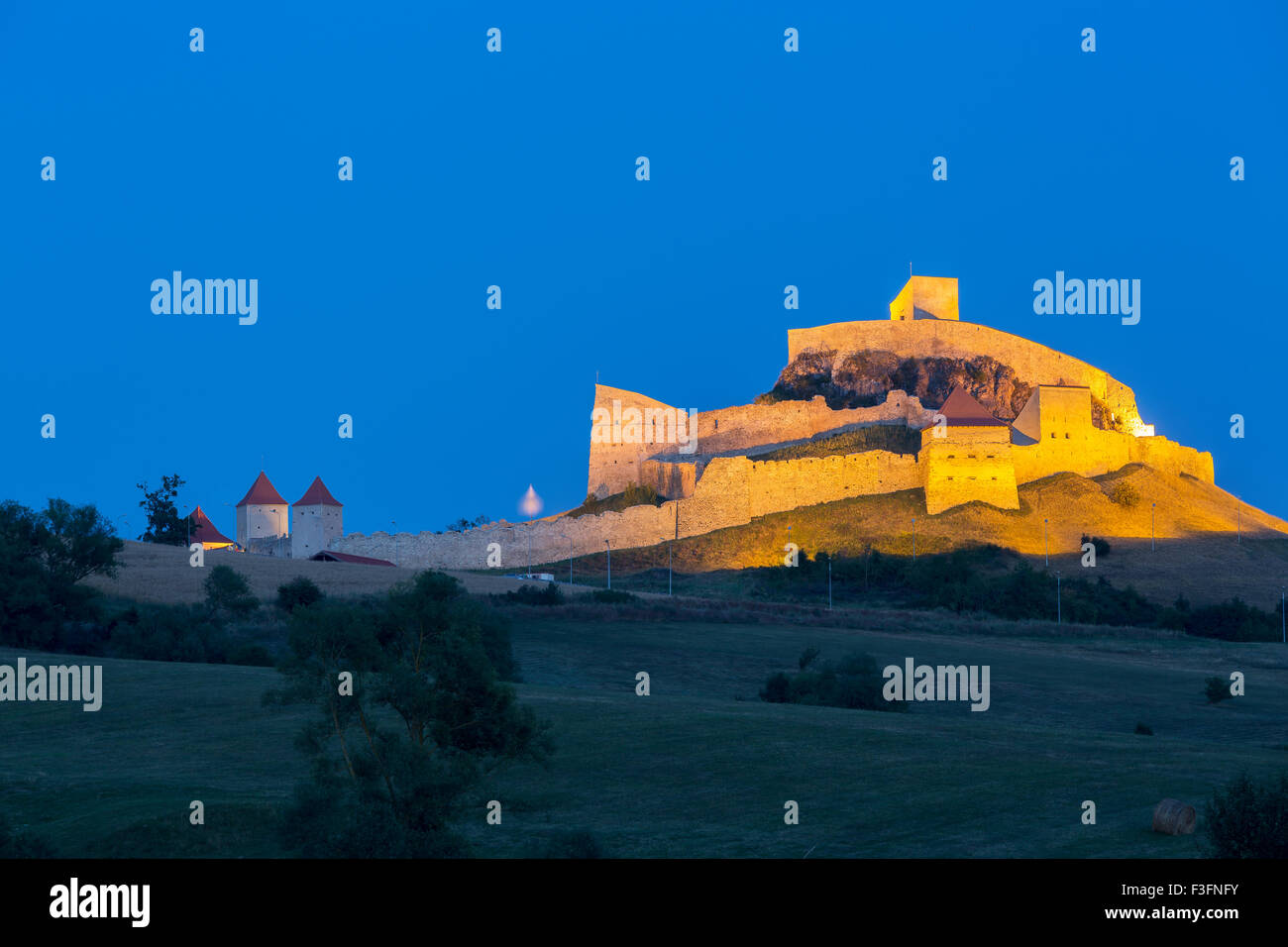 View of the Rupea Medieval Fortress located on a top of a hill in Rupea village in Transylvania, Romania. Stock Photo