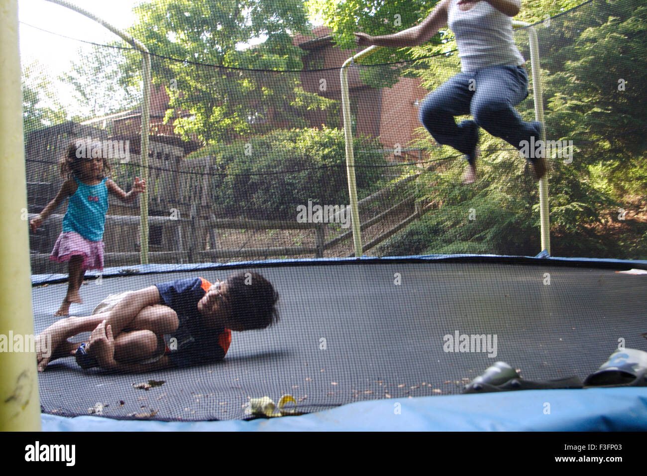 Children playing trampoline, Denver, Colorado, USA, United States of America, US, United States