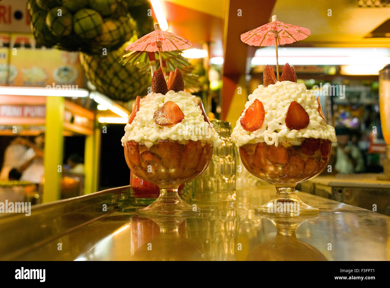 Strawberries with cream at fruit stall at Juhu Chowpaty ; Juhu ; Bombay now Mumbai ; Maharashtra ; India Stock Photo