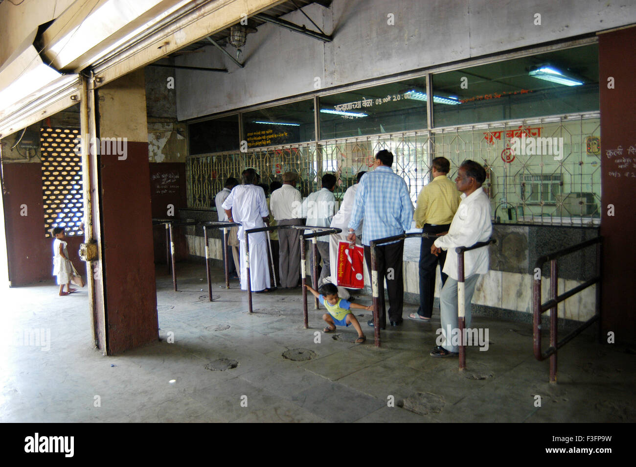 Passengers buying tickets from Maharashtra State Road Transport Corporation ST bus depot, Kurla, Bombay, Mumbai, Maharashtra, India, Asia Stock Photo