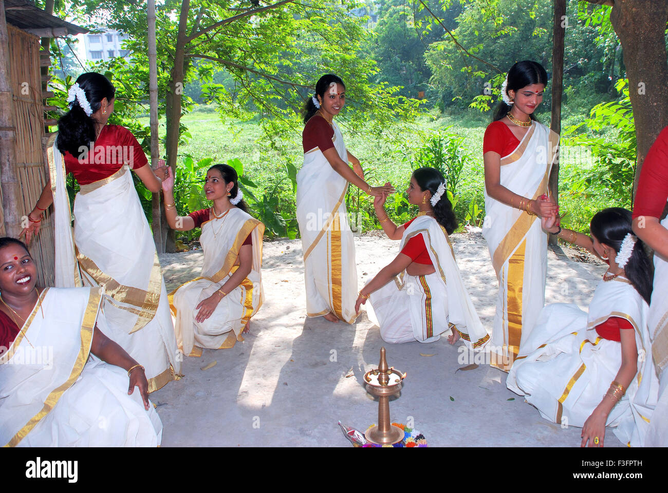 Women celebrating ; Onam Festival ; dancing ; Kaikottikali Dance ; Kerala ; India ; Asia Stock Photo