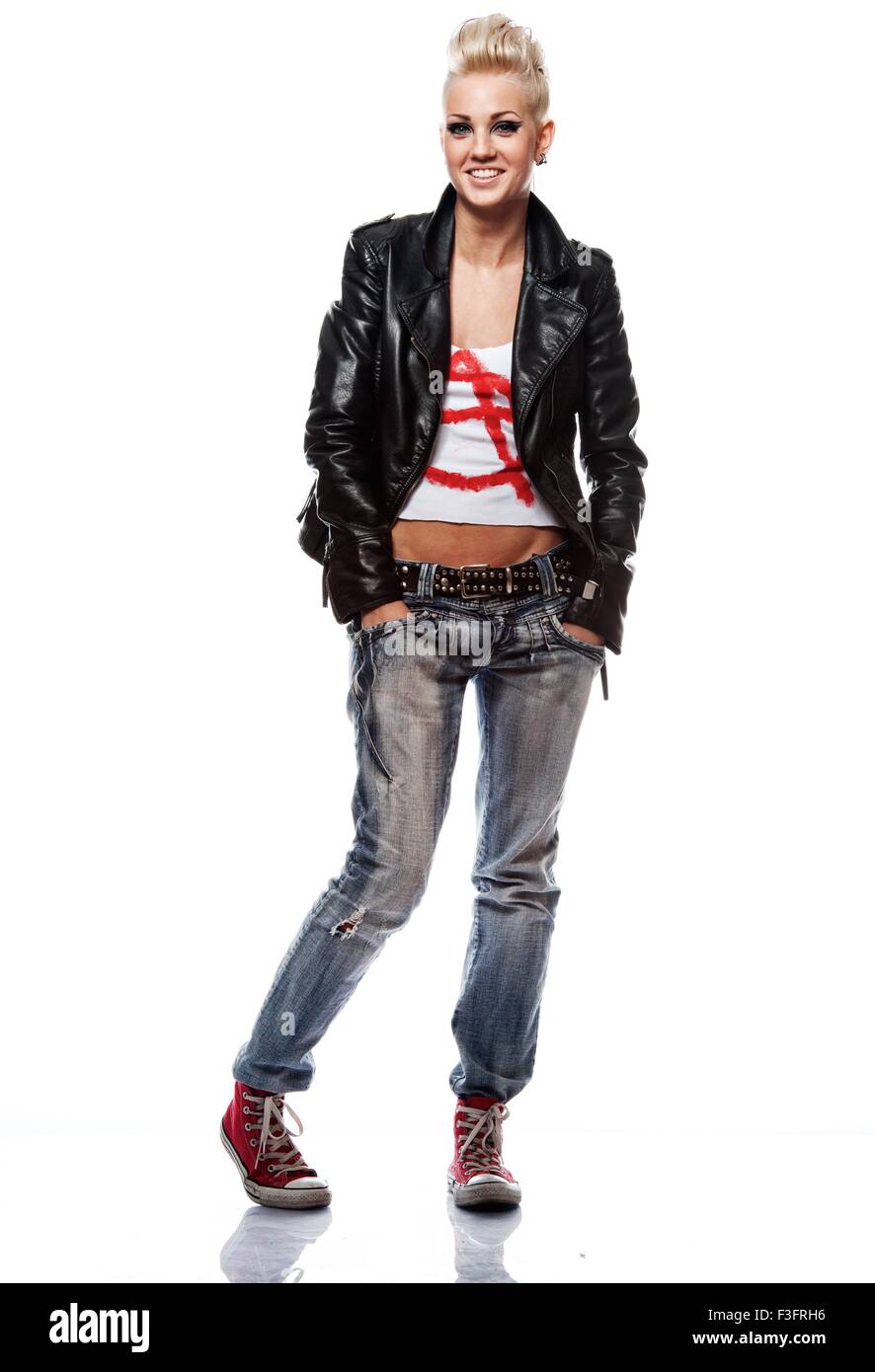 Punk girl in leather jacket smiling Stock Photo