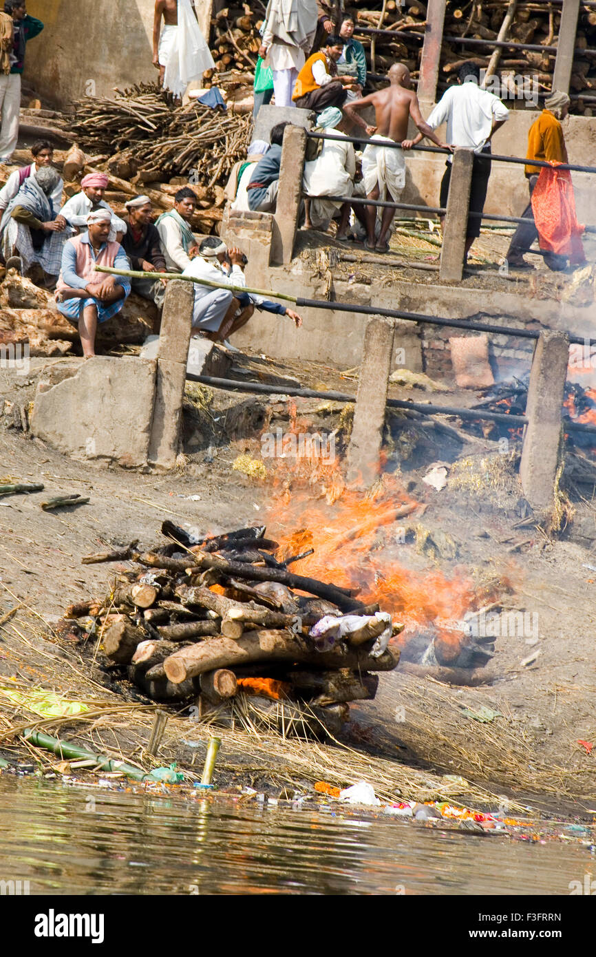Funeral pyre at Ganga river ; Manikarnikai ghat ; Varanasi ; Uttar