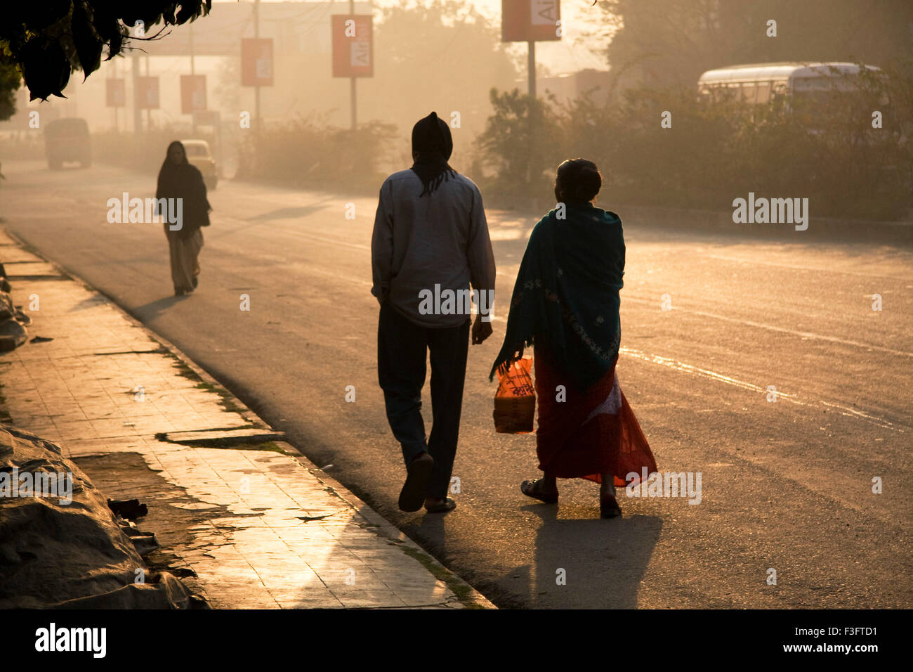 Winter morning ; people going to attend their work ; Calcutta ; West Bengal ; India Stock Photo