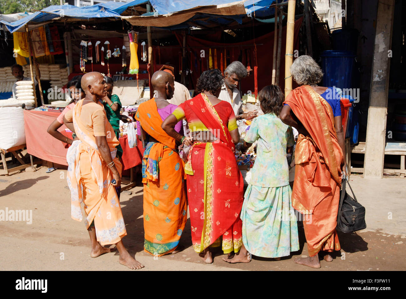 Shopping ; women are buying at stalls ; Tamil Nadu ; India Stock Photo