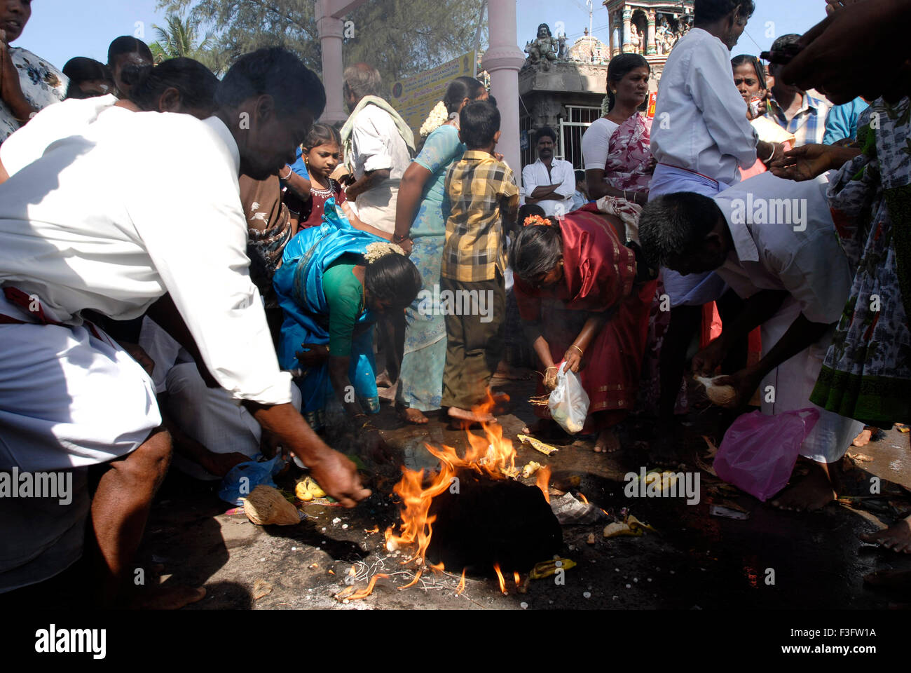 Devotees assembled near the Pillaiyar shrine (Ganpati temple) at the foot of the hill Adivaram Palani ; Tamil Nadu ; India Stock Photo