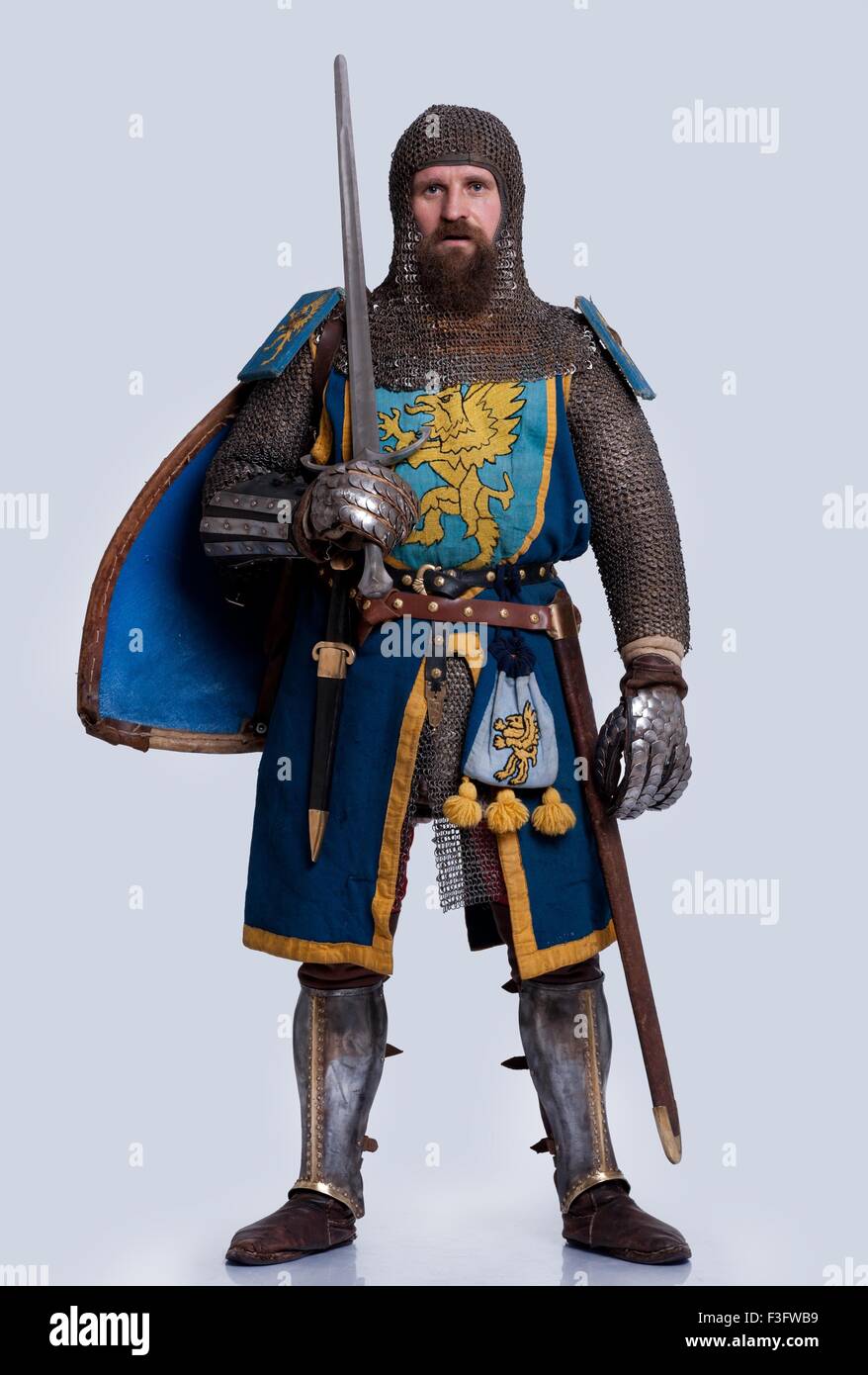Medieval knight isolated on grey background. Stock Photo
