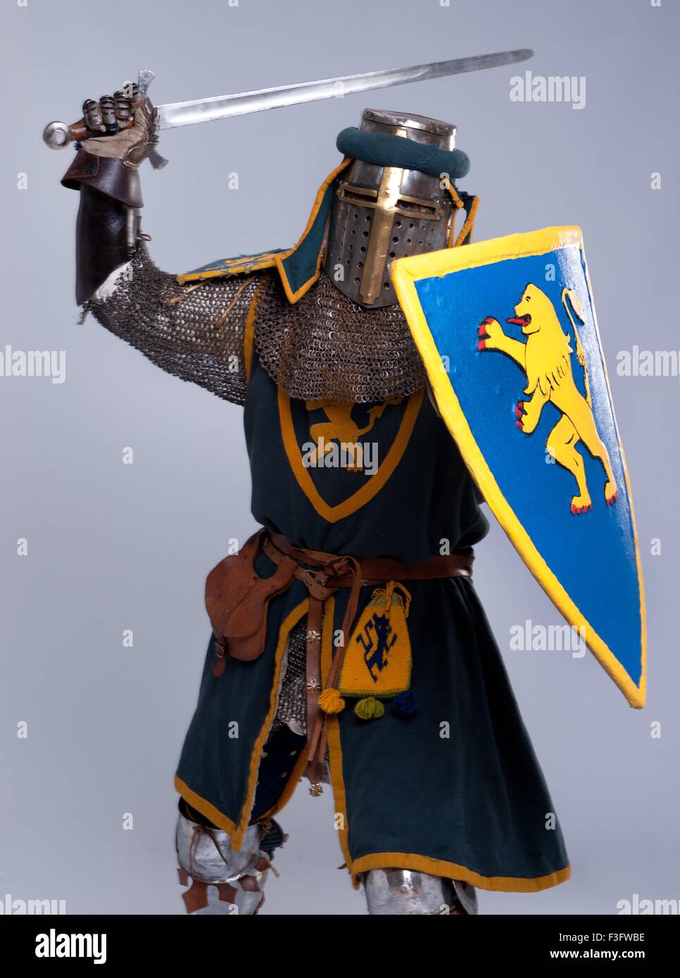 Medieval knight isolated on grey background. Stock Photo