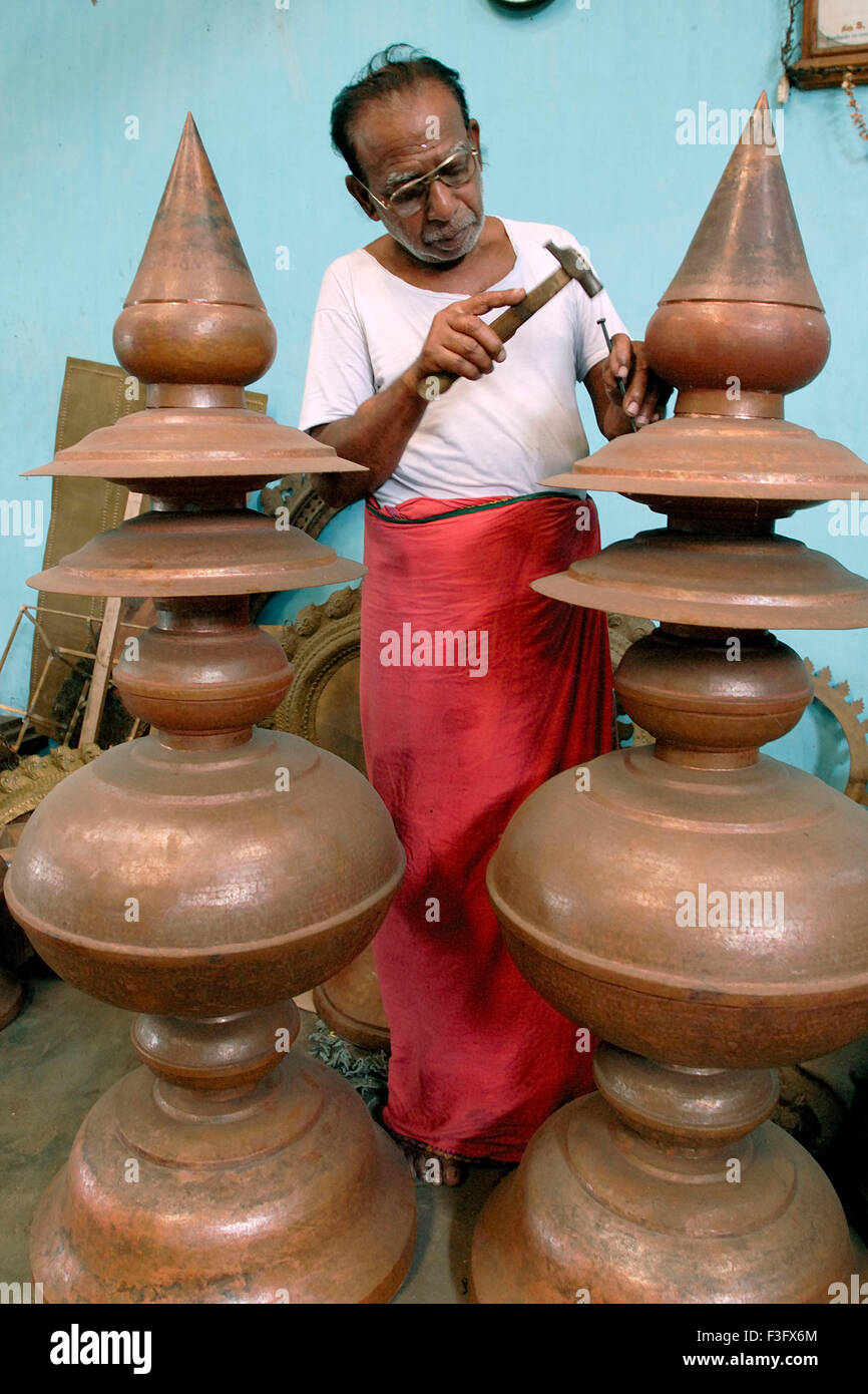 Brass temple Gopura Kalasam making at Swamimalai near Kumbakonam