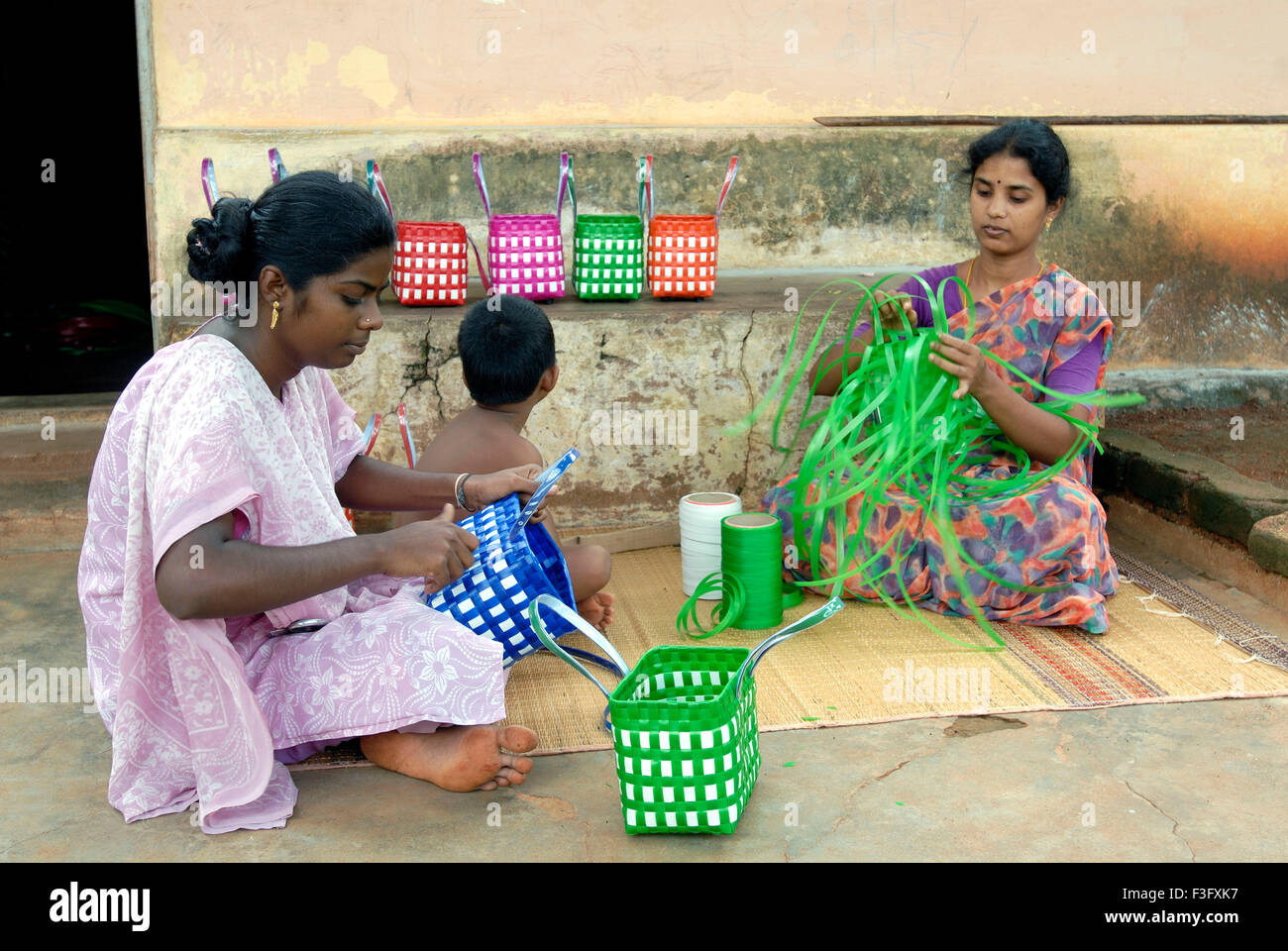 Cottage Industry Woman Weaving Plastic Strips Baskets Tamil