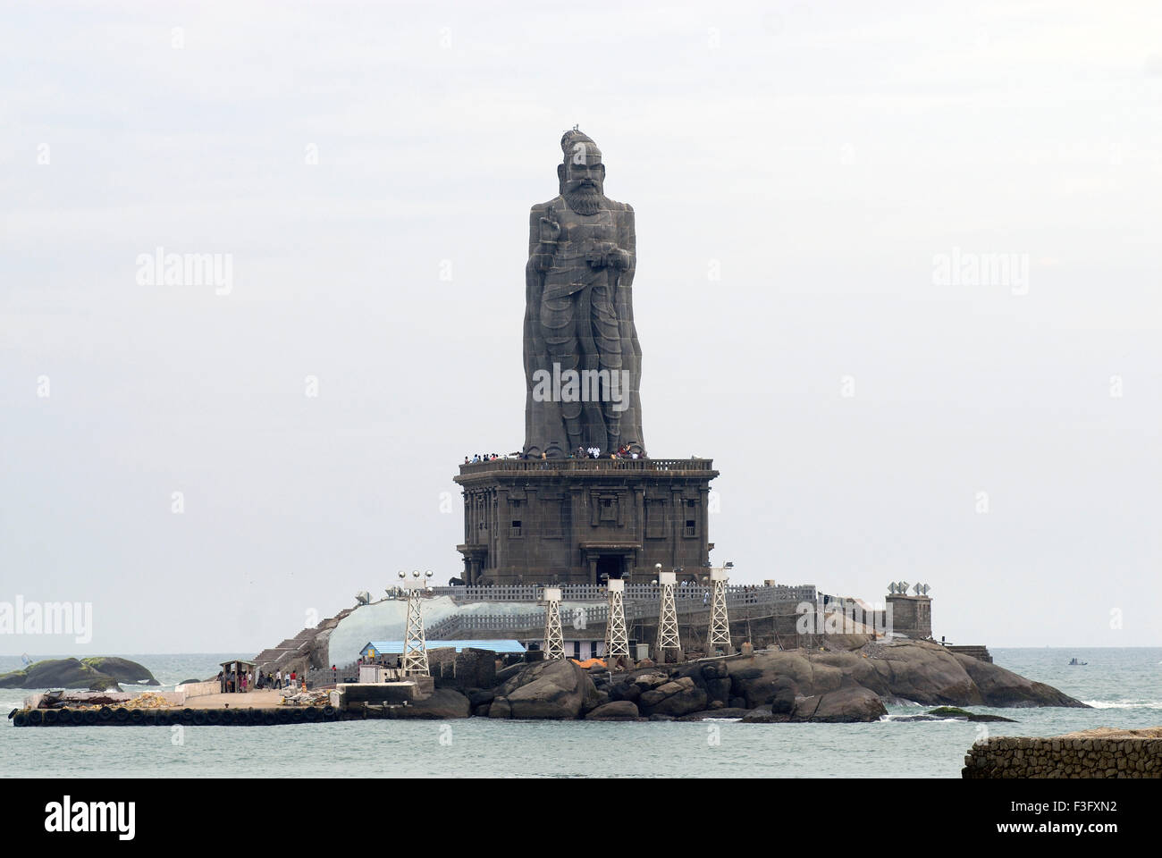 Adjacent to Swami Vivekananda memorial stand 133ft statue of Thiruvalluvar honoured Tamil poet ; Kanyakumari ; Tamil Nadu Stock Photo