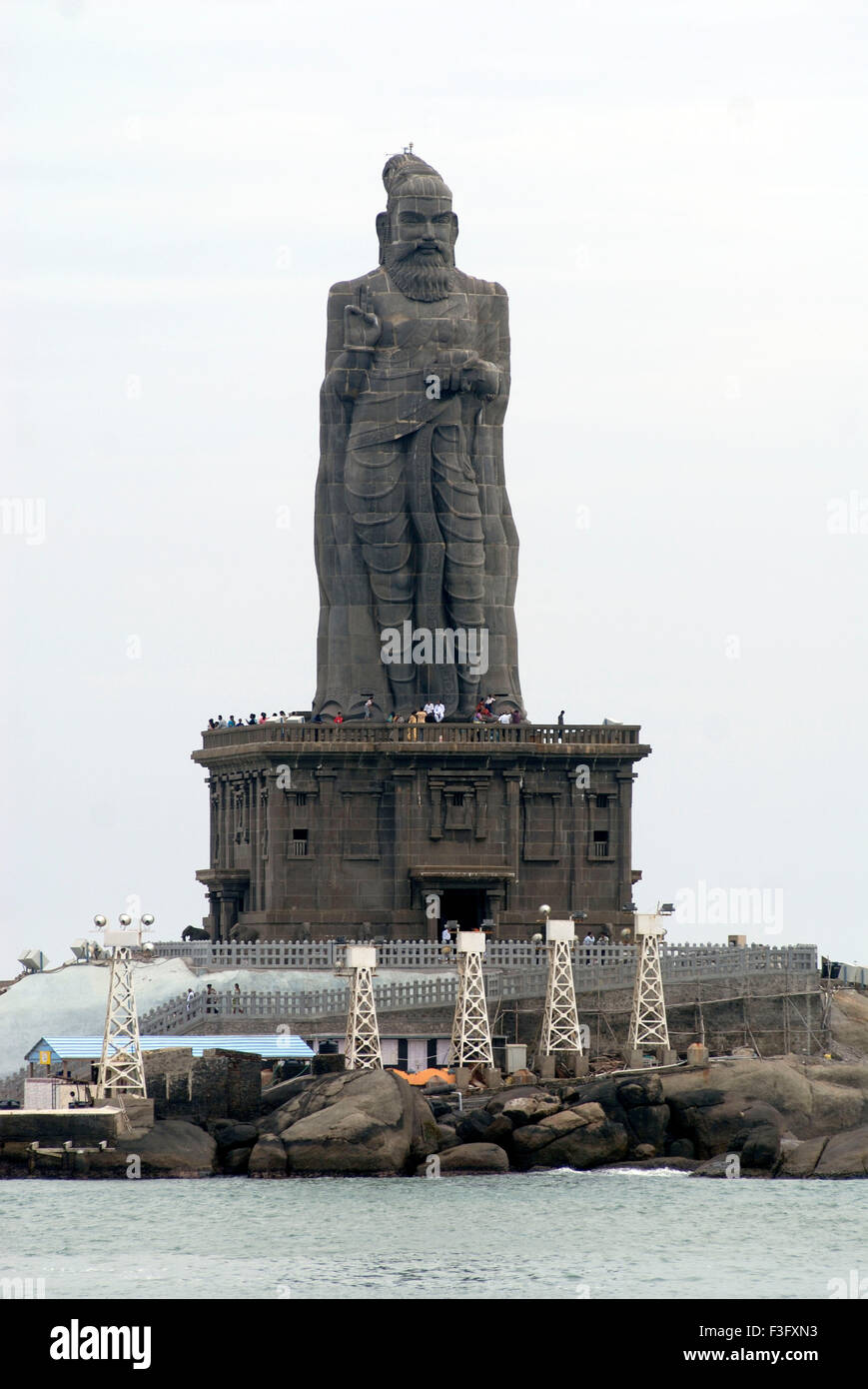 Adjacent to Swami Vivekananda memorial stand 133ft statue of Thiruvalluvar honoured Tamil poet ; Kanyakumari ; Tamil Nadu Stock Photo