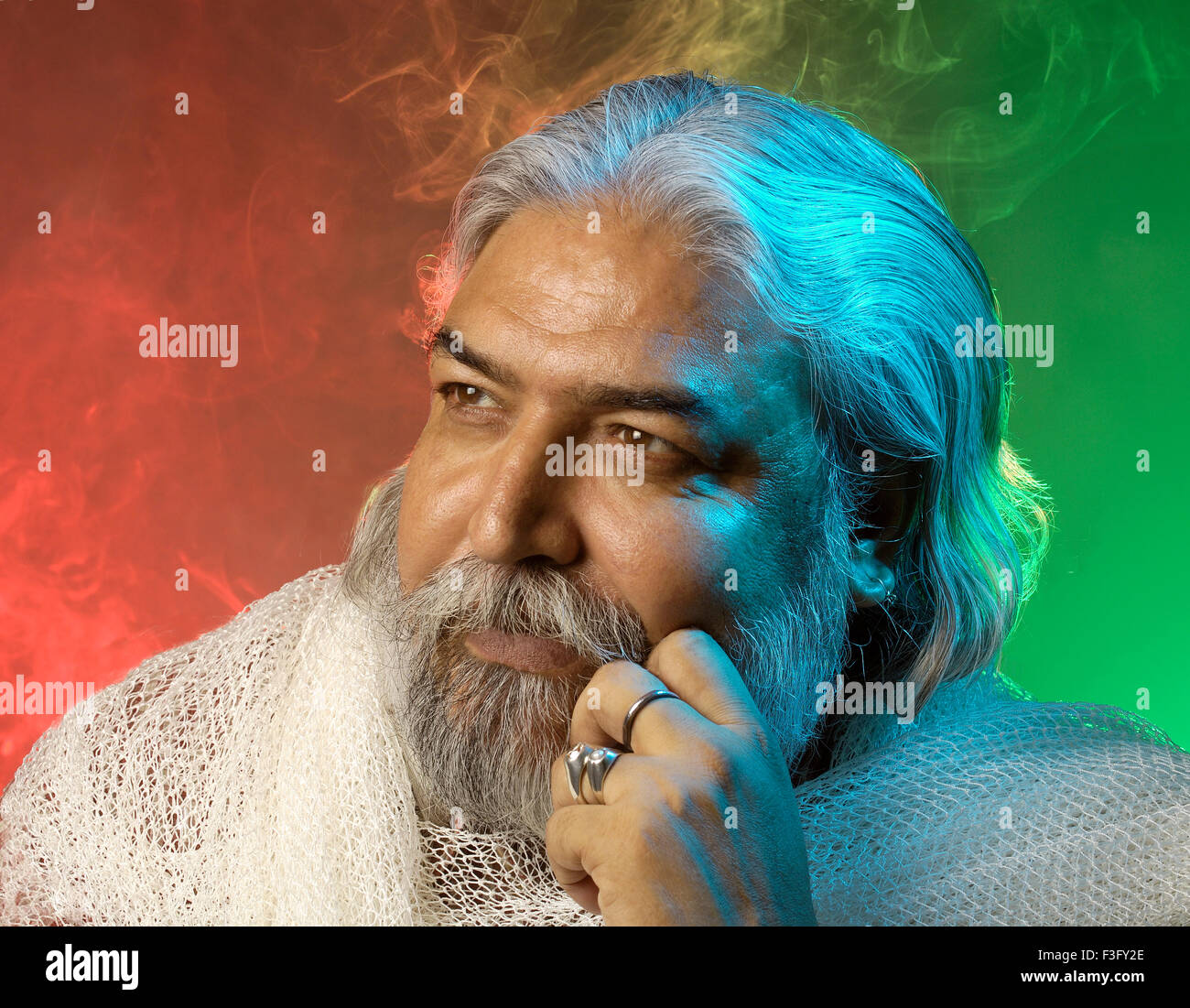 Hindu priest experts in vastu shastra a science of placement ; India ; MR Stock Photo