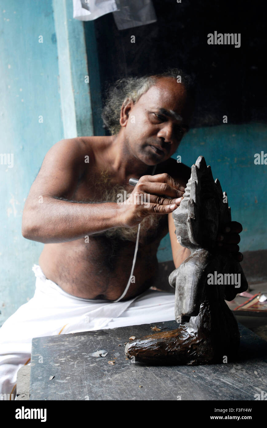 Sculptor making wax image Stock Photo