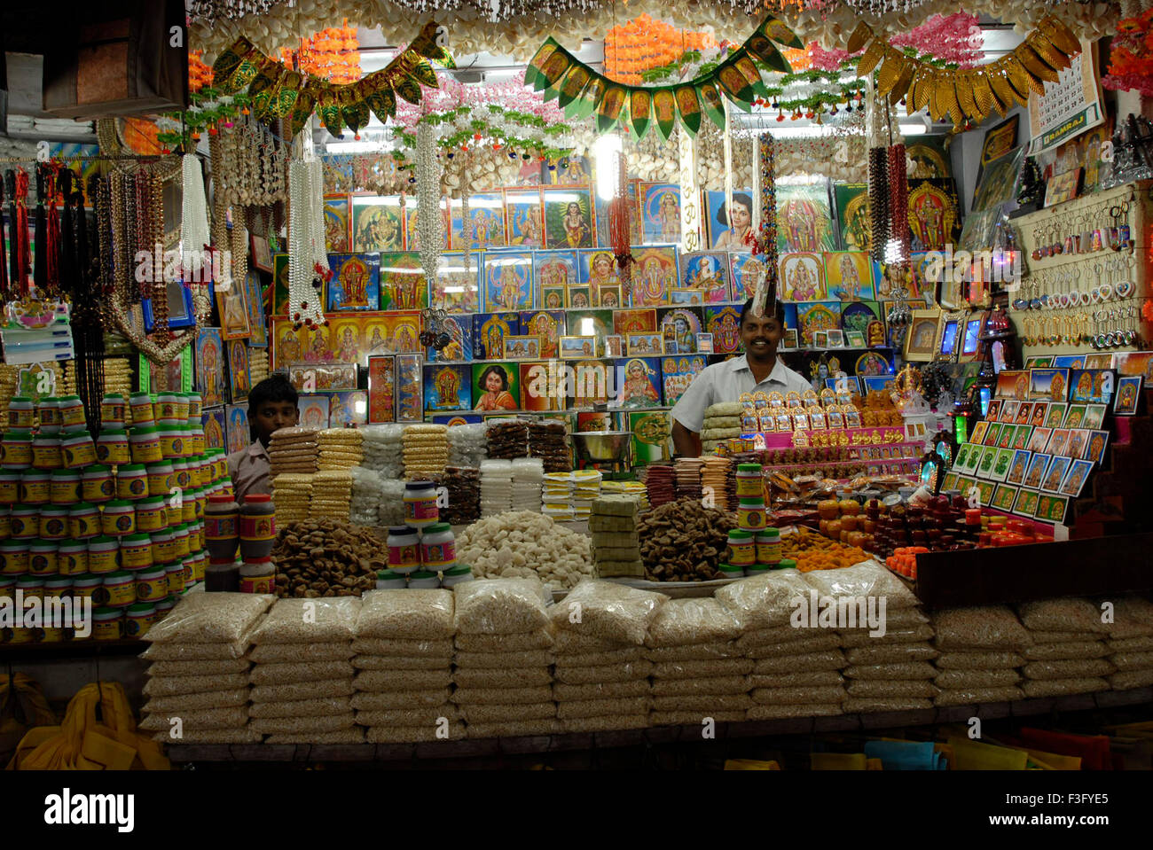 Stall selling religious items ; Tiruchendur; Tamil Nadu ; India Stock Photo