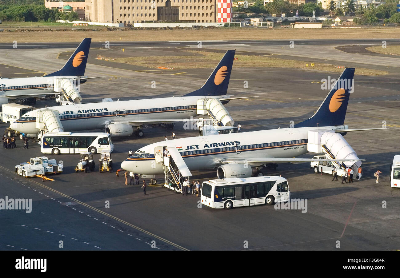 Passengers coming out from Jet Airways Aircrafts parked at CST airport ; Santacruz ; Bombay now Mumbai ; Maharashtra Stock Photo