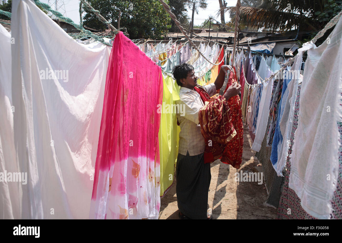 Clothes being hanged for drying at Lower Parel ; Bombay now Mumbai ; Maharashtra ; India Stock Photo