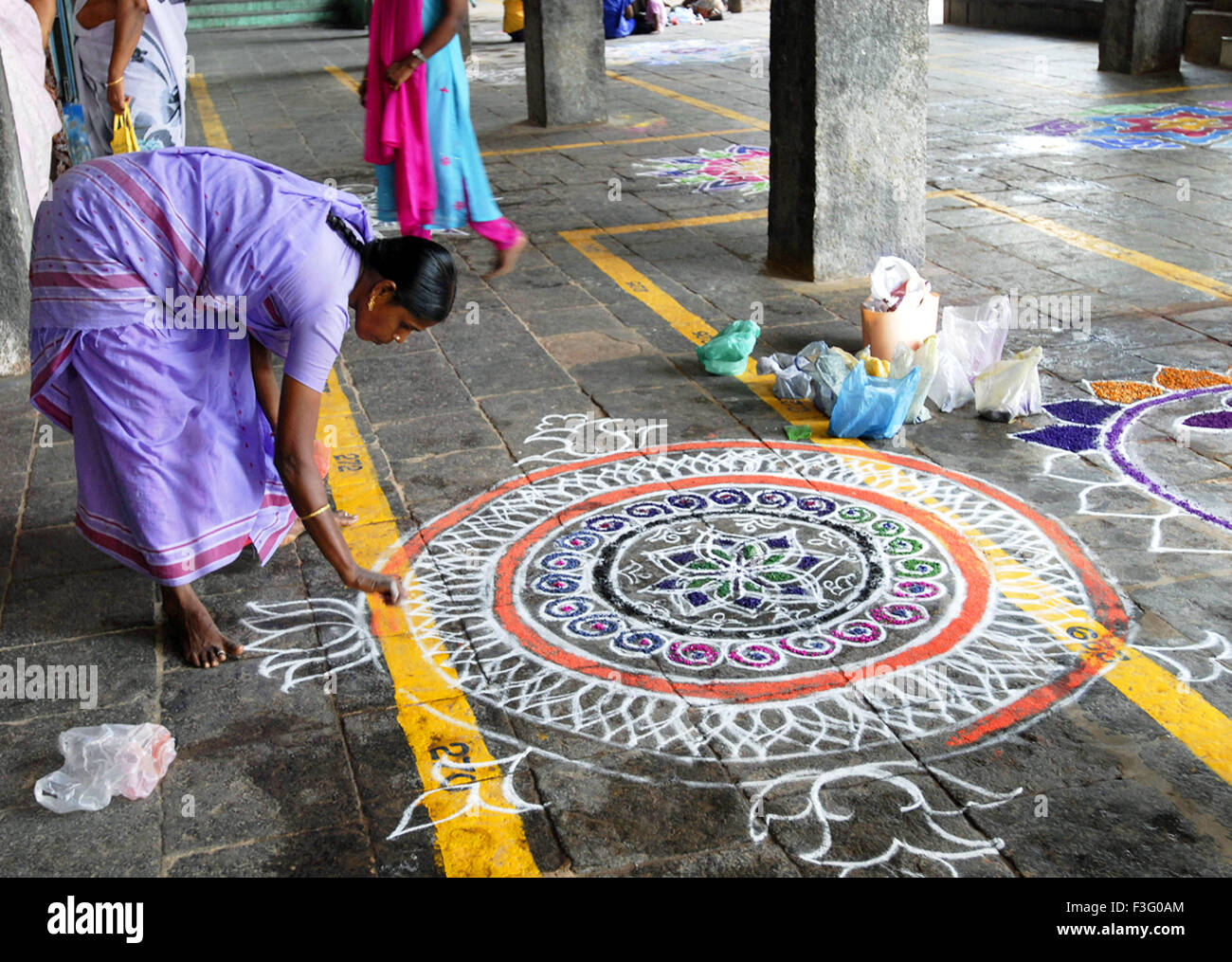 Kolam auspicious art of decorating courtyards of temples ; Tamil Nadu