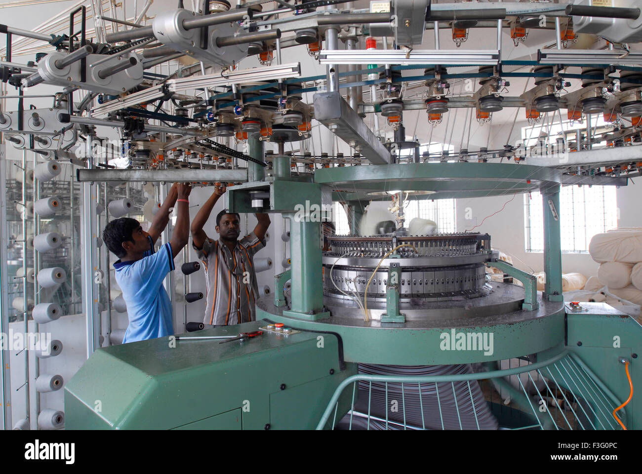 Knitting in a garment industry ; Tirupur ; Tamil Nadu ; India Stock