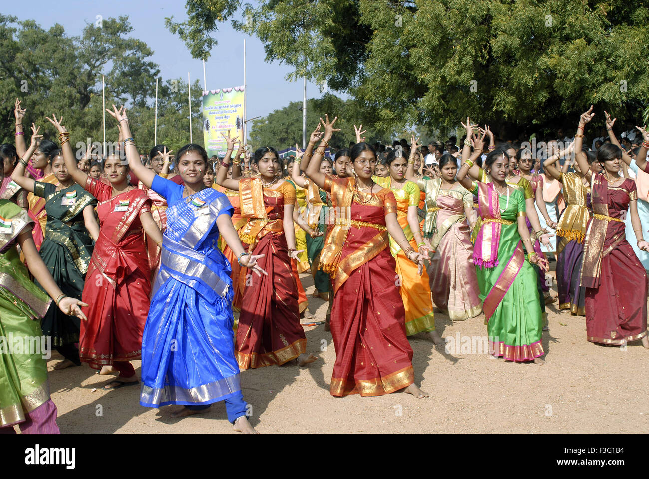 Women performing group dances in festive program ; Kerala ; India Stock Photo