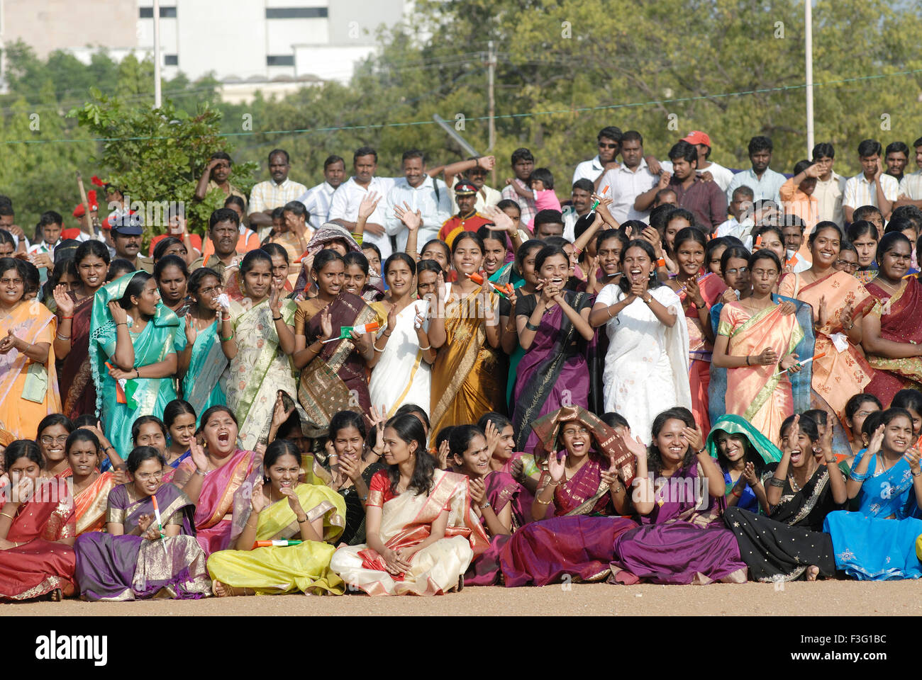 People watching standing sitting smiling ; Kerala ; India ; Asia Stock Photo