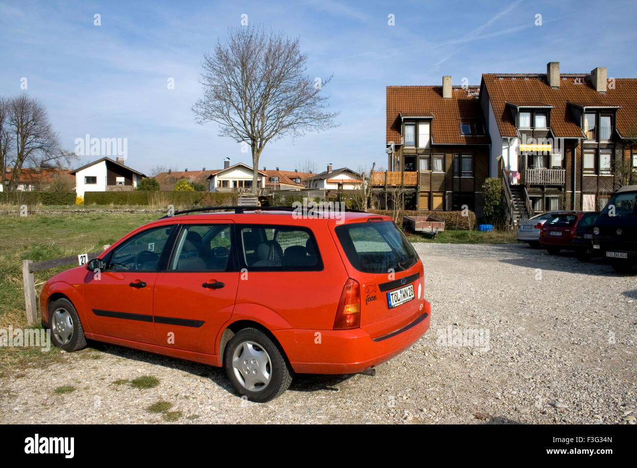 Red car ; Wolfratshausen ; Bad Tolz ; Bavaria ; Munchi ; Germany ; Europe Stock Photo