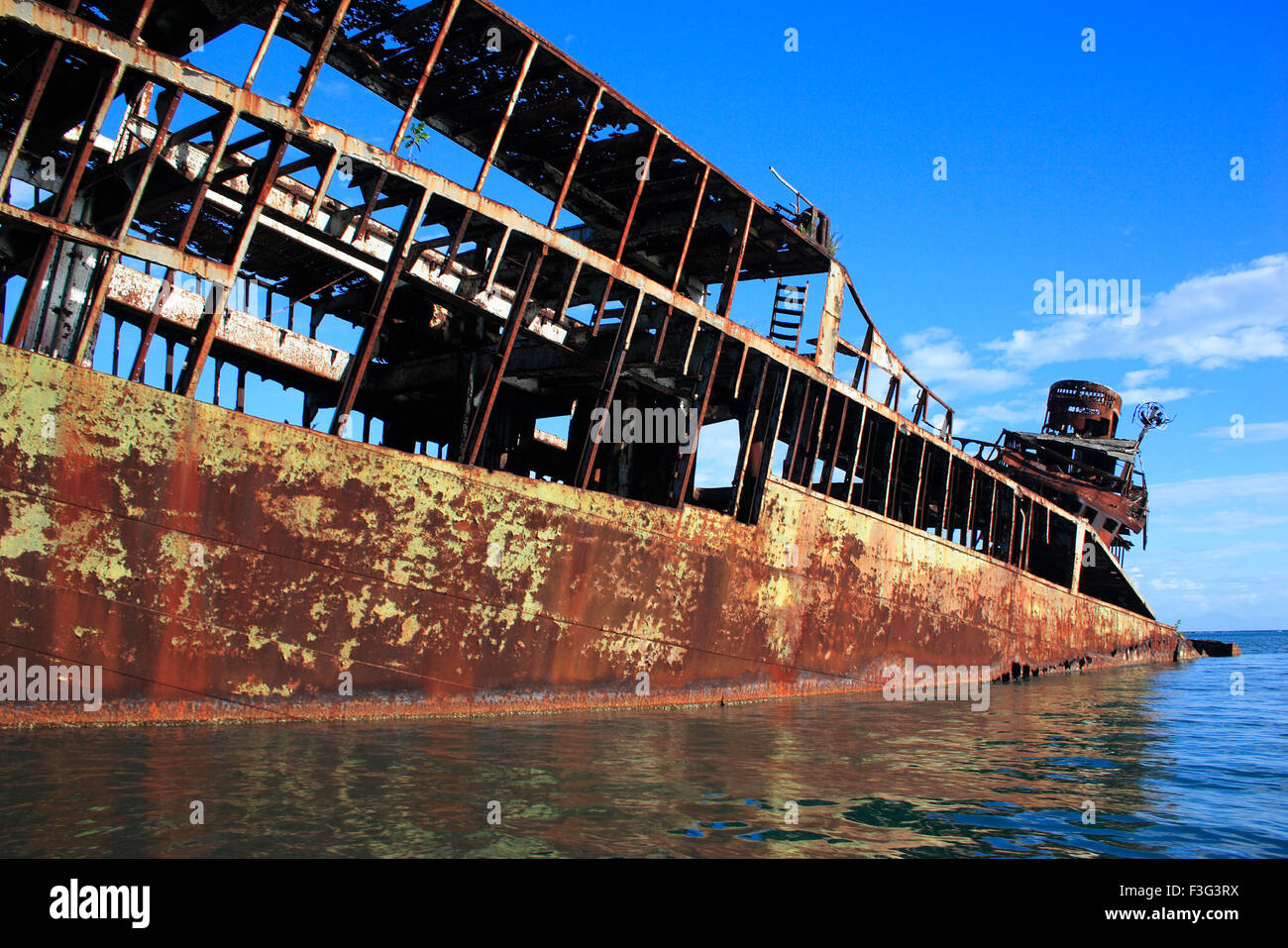 Wrecked ship near Dixon cove ; Roatan island ; country Honduras Stock Photo
