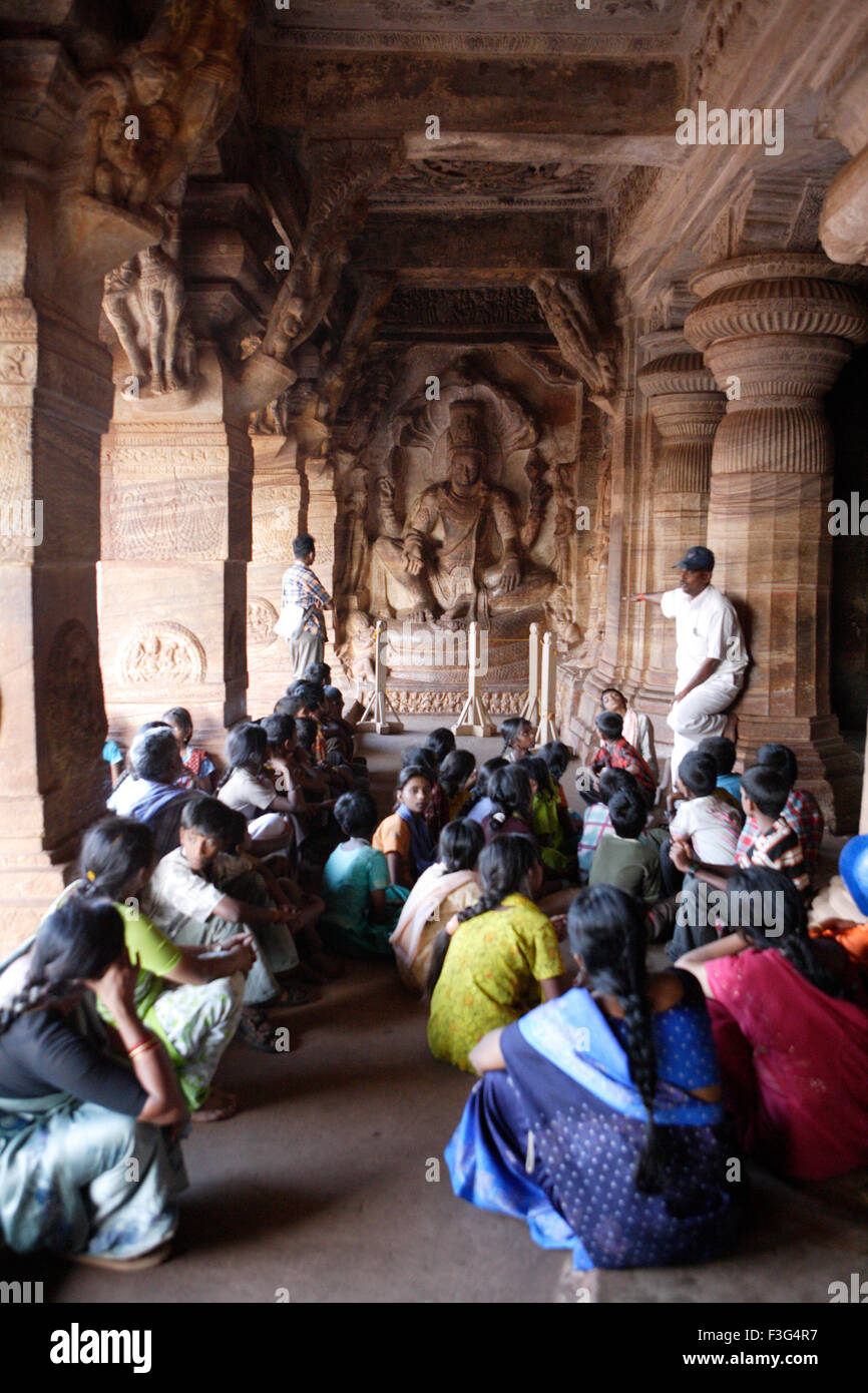 People Visiting Badami ; Chalukya Cave 3575 A.D.   585 A.D. ; UNESCO World Heritage Site ; Bagalkot ; Karnataka Stock Photo