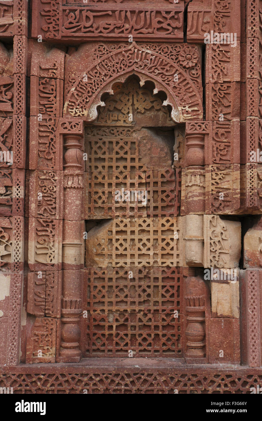 Islamic ornamentation in Qutb Minar complex built in 1311red sandstone ; Indo Muslim art ; Delhi Stock Photo