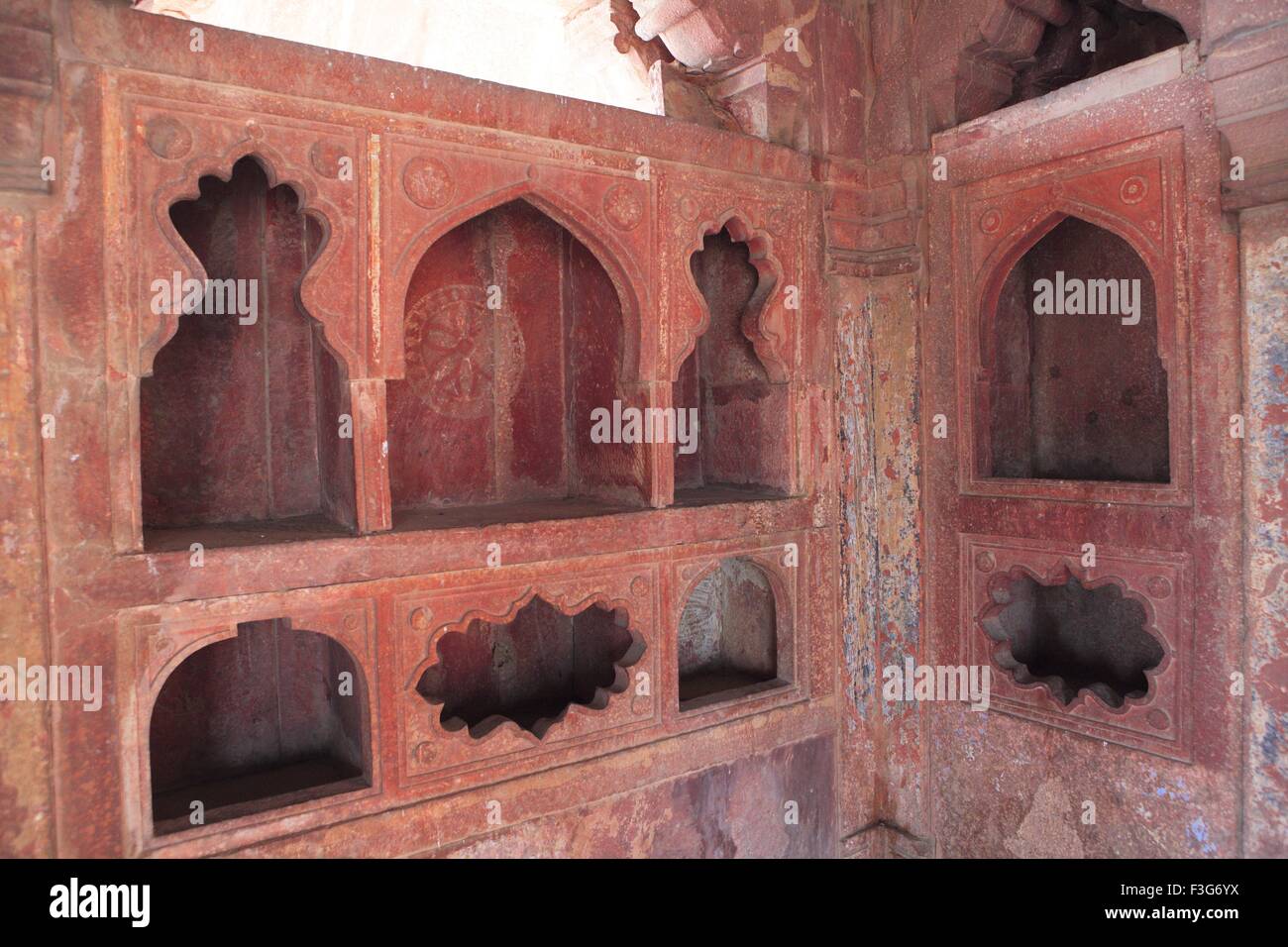 Red sandstone cupboards in Fatehpur Sikri ; Agra; Uttar Pradesh ; India UNESCO World Heritage Site Stock Photo