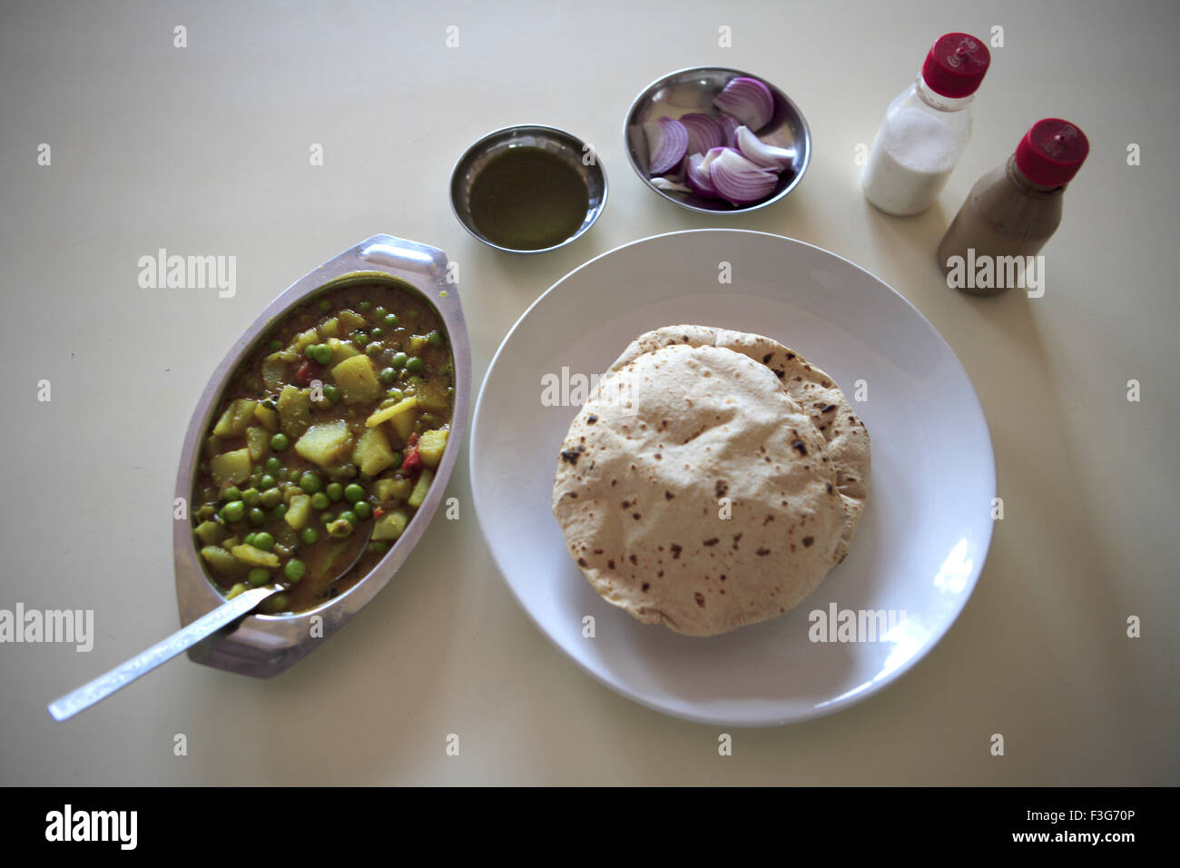 Vegetarian dish ; Aloo Mutter Roti Indian Bread ; Agra ; Uttar Pradesh ; India Stock Photo