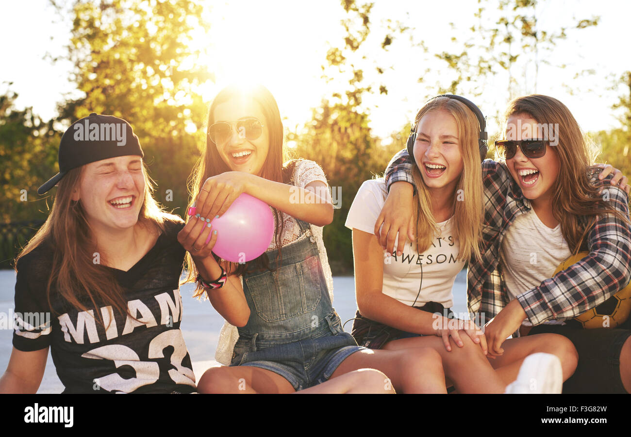 Friends having fun outside on a summer day Stock Photo