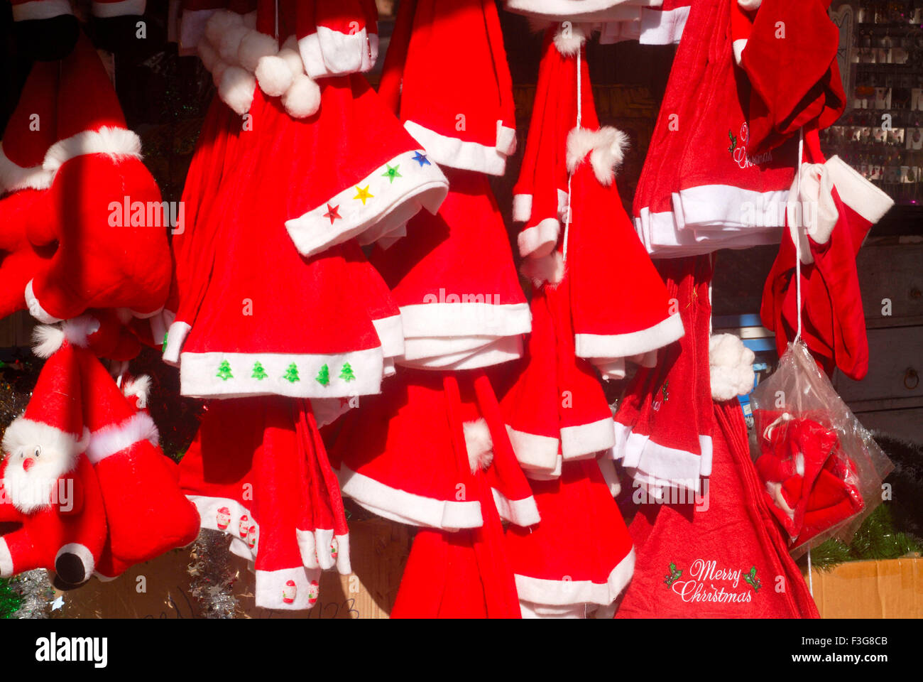 Red color Santa Claus hats kept celebrating Christmas Festival kept sell shop Borivali Mumbai Stock Photo