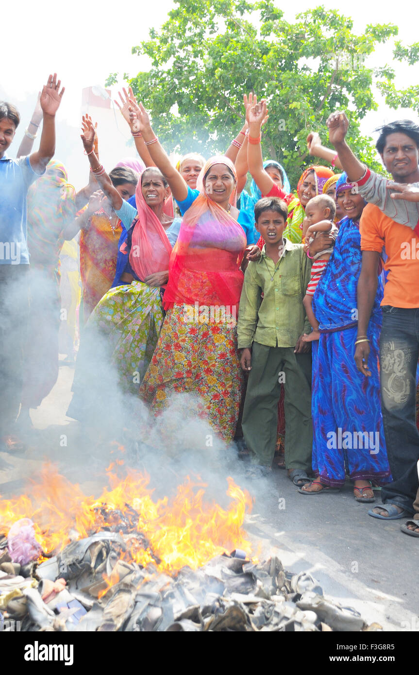 Firing waste on road people protesting for water supply ; Jodhpur ; Rajasthan ; India Stock Photo