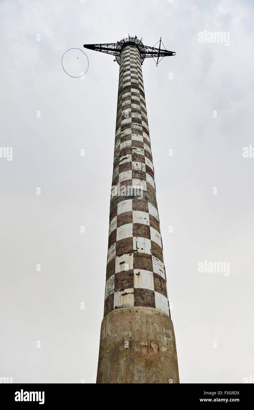 Industrial view with an abandoned parachute jump tower Stock Photo