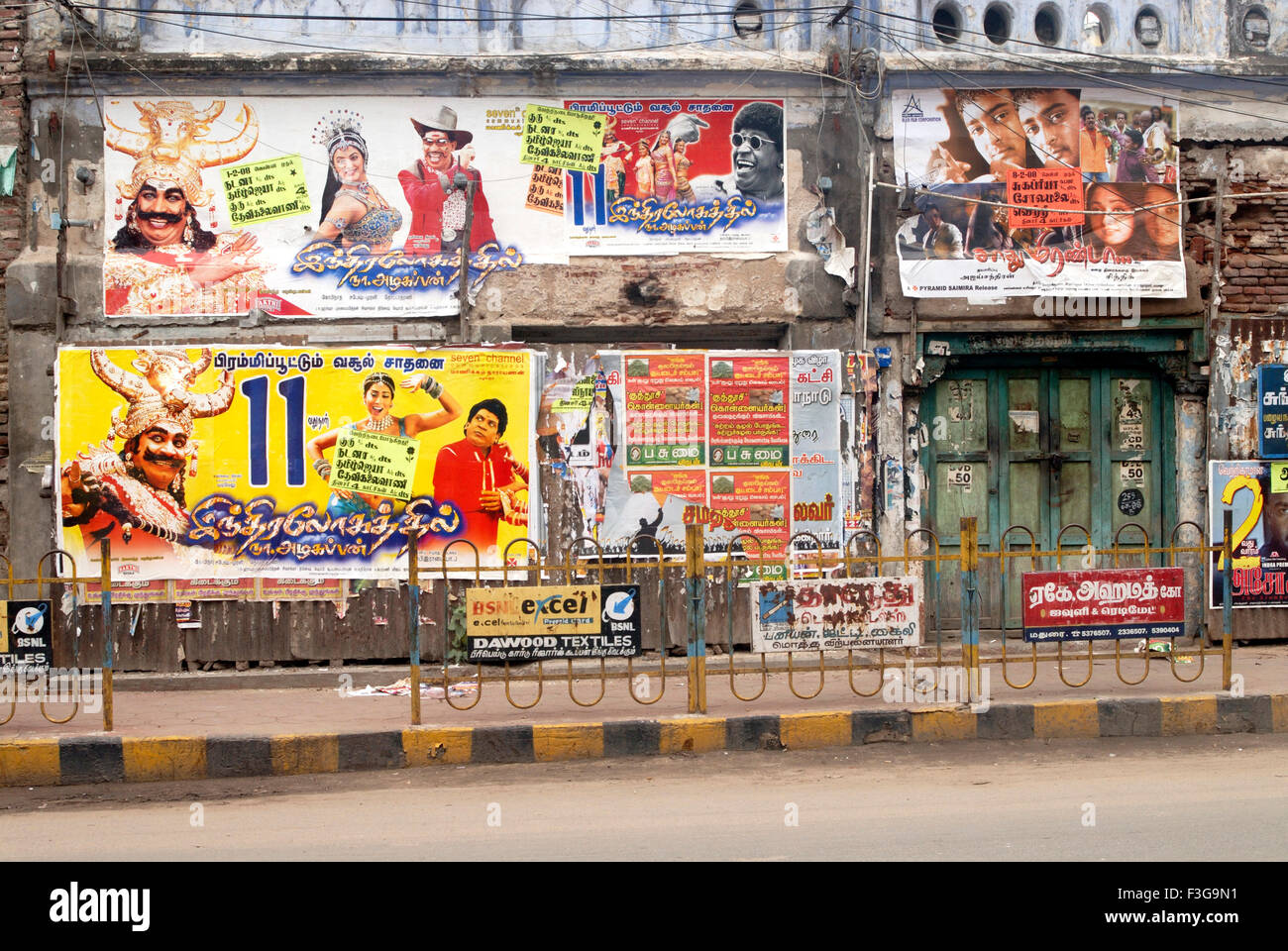 Colourful posters of movies of tamil film industry ; Madurai ; Tamil Nadu ; India Stock Photo
