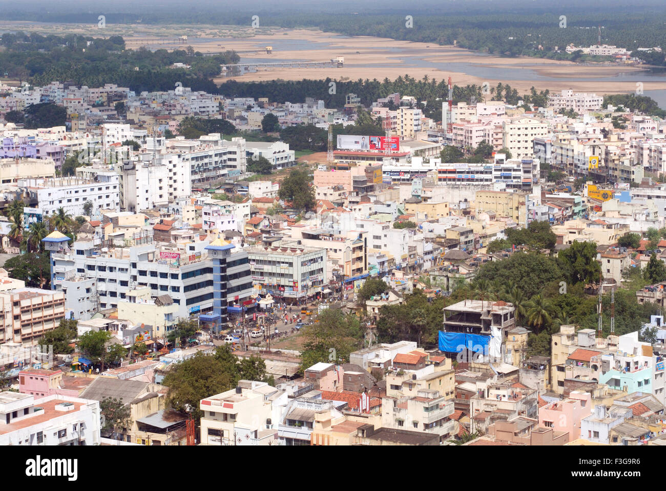 Aerial view of congested multistoreyed buildings of city situated on the banks of river Cauvery ; Tiruchirappalli ; Trichy Stock Photo