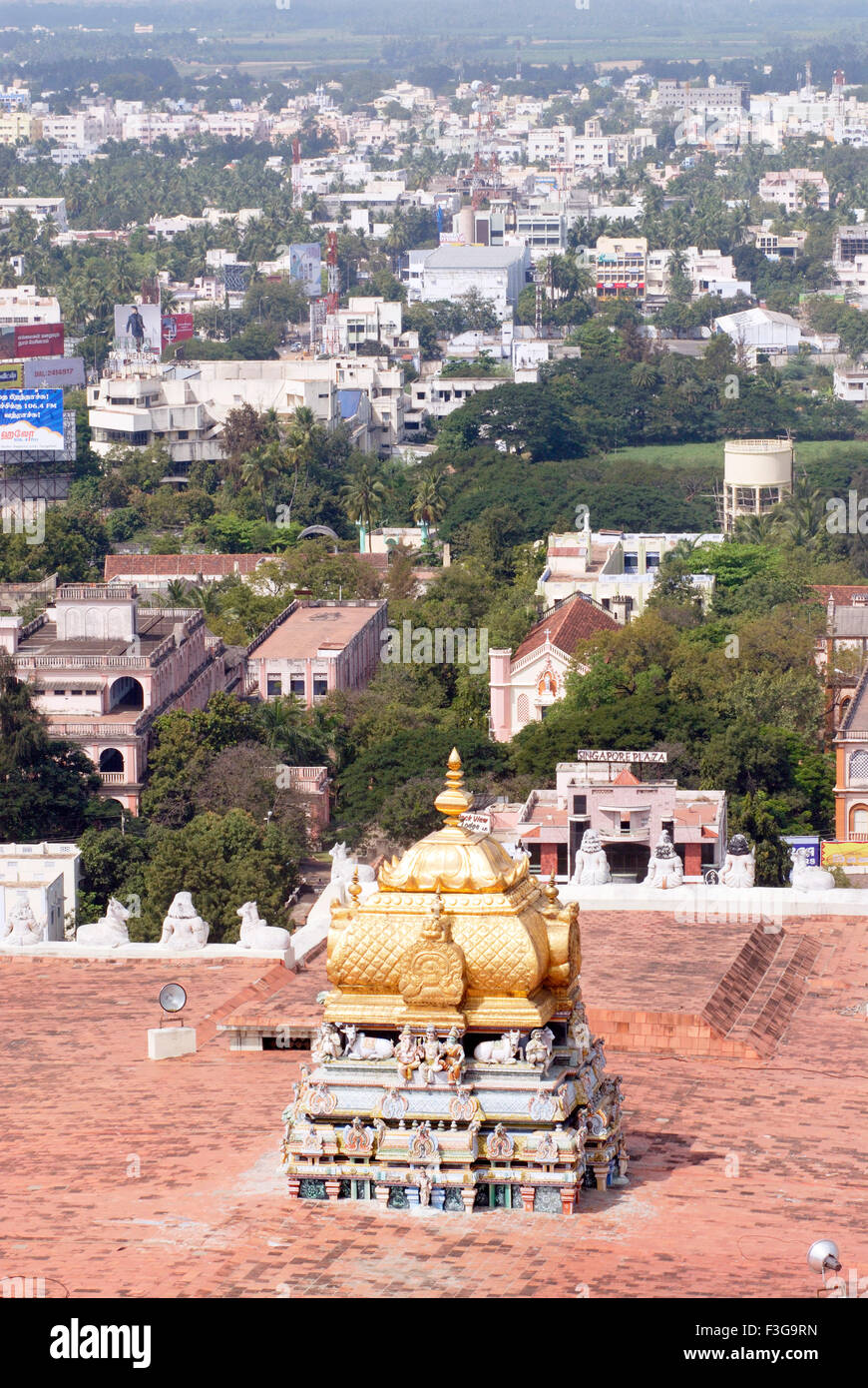 Aerial view gold plated mythological deities Vimanam Shri Thayumanaswami temple dedicated lord Shiva Tiruchirappalli Trichy Stock Photo