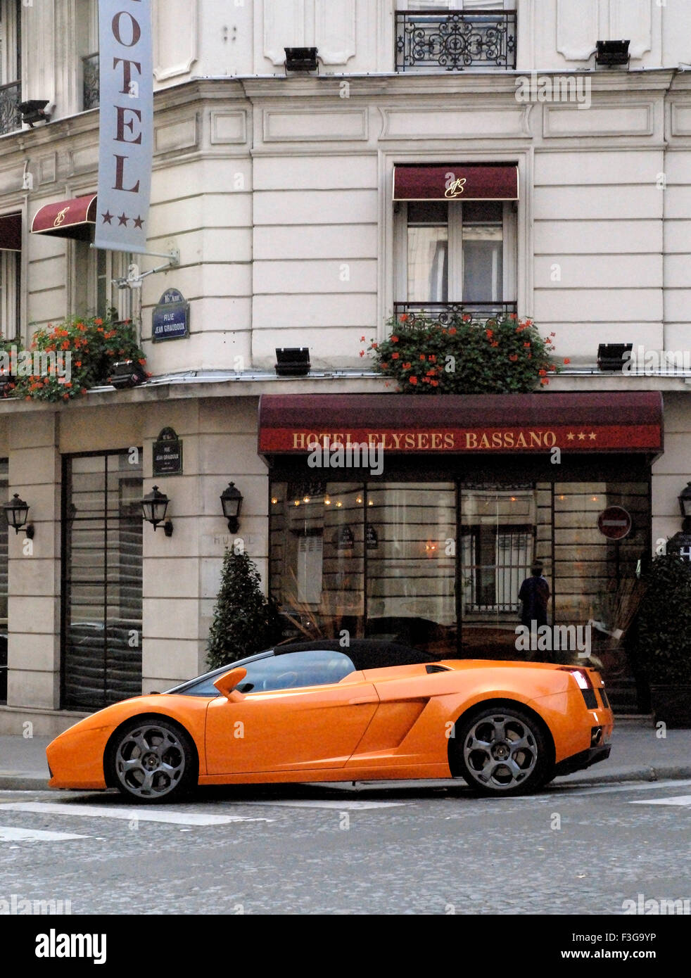 Lamborghini car parked outside Louis Vuitton shop in Stoleshnikov