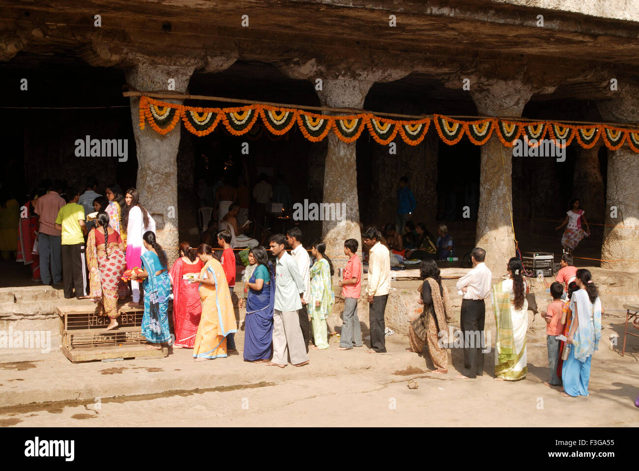 Devotees of lord shiva gathered for celebrating mahashivaratri festival at Mandapeshwar caves ; Borivali Mumbai ; Maharashtra Stock Photo