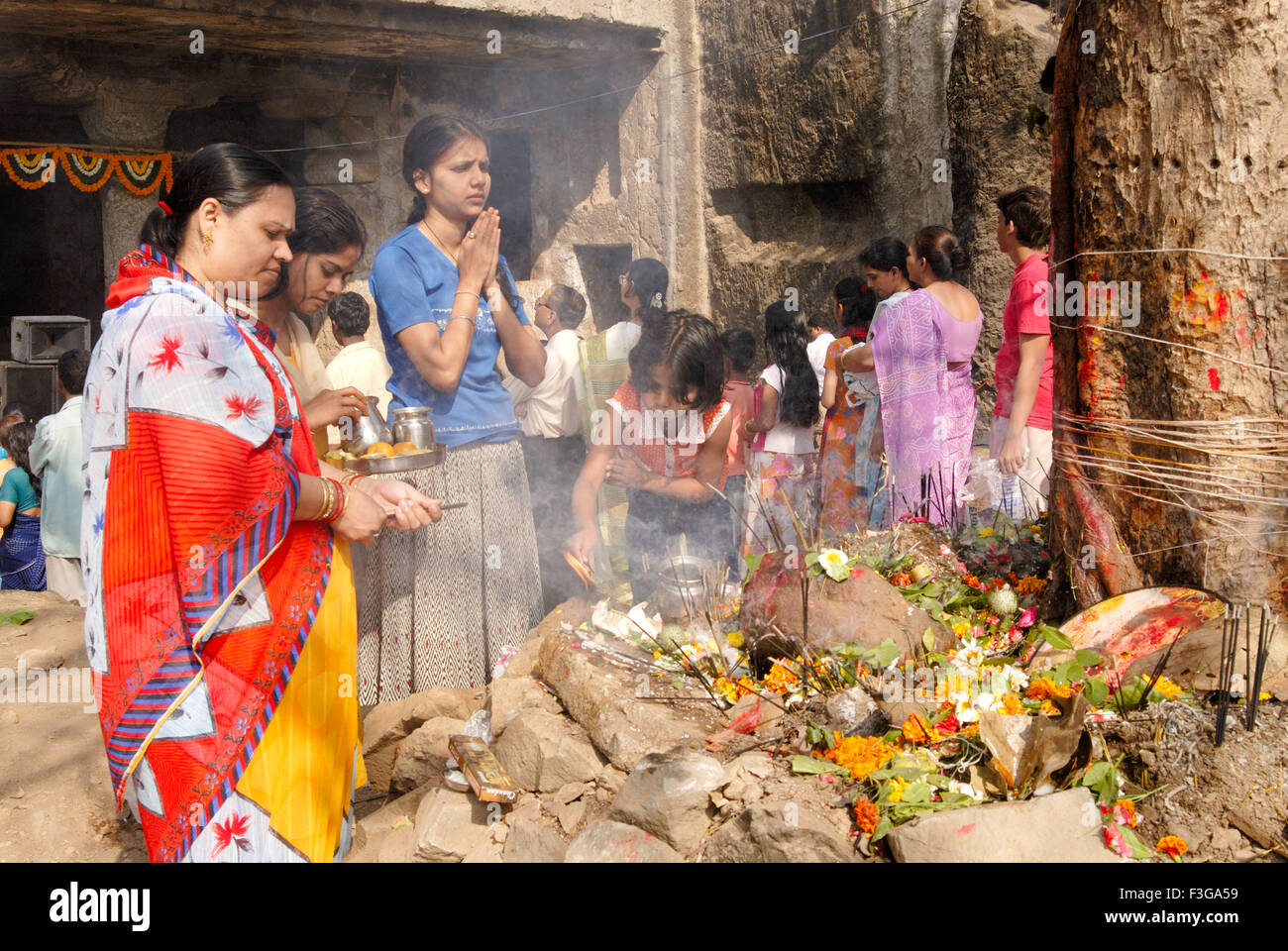 Devotees of lord shiva gathered for celebrating mahashivaratri festival at Mandapeshwar caves ; Borivali ; Bombay Mumbai Stock Photo